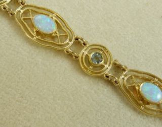 Gorgeous 3 75ct Opal 0 80ct Blue Topaz 9ct Yellow Gold Bracelet