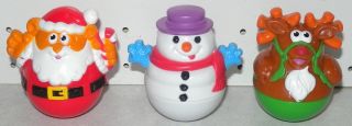 Holiday weebles measure about 2.5 tall x 2.5 wide and are in good