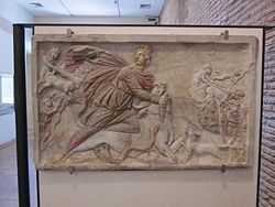 In this relief depicting a Mithraic tauroctony , Luna drives a biga
