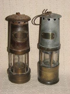 TWO VINTAGE MINERS LAMPS A THOMAS & WILLIAMS LTD AND A J.H NAYLOR LTD
