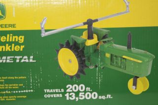 John Deere Metal Traveling Tractor Sprinkler Model 4010 J
