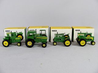 Eight John Deere Miniature Toy Tractors Ertl