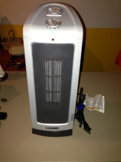 5307 Oscillating Ceramic Tower Space Heater With Adjustable Thermostat