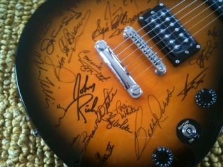 Autographed Opry Guitar Buck Owens Mel Tillis and More