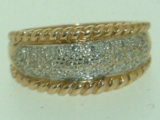 Pretty 9 carat gold 0.22 carat diamond band ring