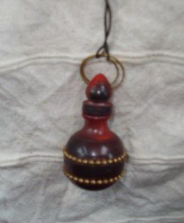 Perfume / Poison Bottle cherry red horn pendant necklace on thong
