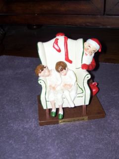 Norman Rockwells Figurine by FTD. Santa Delivering Presents Children