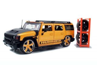 LOPRO VERSION HUMMER H2 1/24 DIE CAST W/ EXTRA RIMS YELLOW 96613 NEW