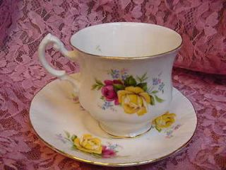 By Appointment To Her Majesty the Queen Paragon Bone China cup and