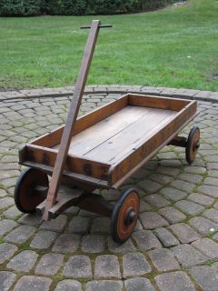 Antique Childrens pull wagon, wooden/wooden wheels Red Wing printed