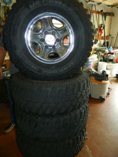 DEFINITY M/T LT285/75R16 MUD 4 TIRES & RIMS USED LOCAL PICK UP ONLY