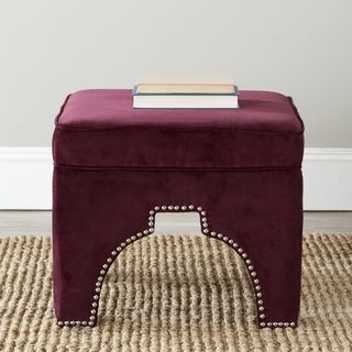 Safavieh Sahara Bordeaux Red Nailhead Ottoman (Bordeaux RedMaterials: Plywood and cotton fabricSeat height: 17.9 inchesDimensions: 17.9 inches high x 21.3 inches wide x 21.3 inches deepThis product will ship to you in 1 boxFurniture arrives fully assemble