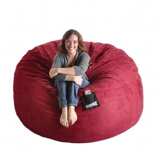 Cinnabar Red 6 foot Microfiber And Foam Bean Bag (Cinnabar RedMaterials: Durafoam foam blend, microfiber outer cover, cotton/poly inner linerStyle: RoundWeight: 75 poundsDimensions: 72 inches x 72 inches x 34 inches Fill: Durafoam blendClosure: ZipperRemo